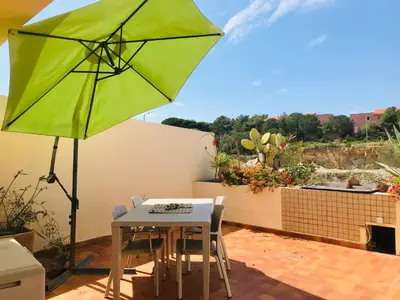 Jardin de l'établissement Appartement T2 Porto Ambroggio 35 LUMIO