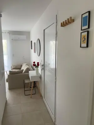 Coin salon dans l'établissement App. 2 p design zen vue mer N182