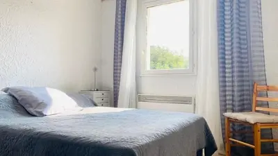 Un ou plusieurs lits dans un hébergement de l'établissement Appartement Boug 1 Lumio