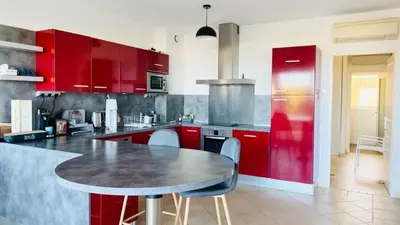 Cuisine ou kitchenette dans l'établissement Appartement T3 La Residence S LUMIO