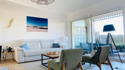 Coin salon dans l'établissement Appartement T3 La Residence S LUMIO