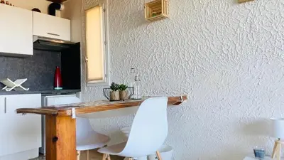 Cuisine ou kitchenette dans l'établissement Studio Cocody 228 LUMIO