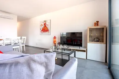 Télévision ou salle de divertissement dans l'établissement Stella di Luce - Appt climatisé vue mer