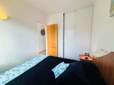 Un ou plusieurs lits dans un hébergement de l'établissement Appartement Boug 27 Lumio