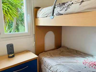 Un ou plusieurs lits dans un hébergement de l'établissement Appartement Boug 27 Lumio