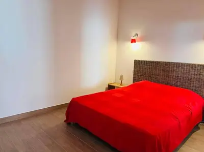 Un ou plusieurs lits dans un hébergement de l'établissement Appartement T4 Le Clos des Oliviers 13 L'ILE ROUSSE