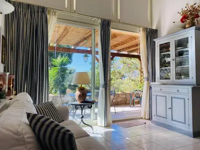 Coin salon dans l'établissement Appartement Libeccio 1 LUMIO