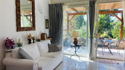 Coin salon dans l'établissement Appartement Libeccio 1 LUMIO