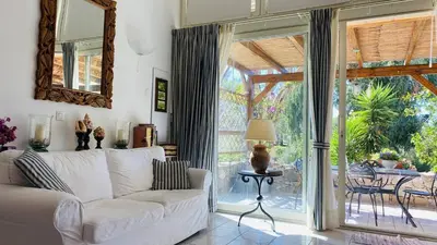 Coin salon dans l'établissement Appartement Libeccio 1 LUMIO
