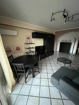 Coin salon dans l'établissement Appartement T4