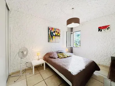 Un ou plusieurs lits dans un hébergement de l'établissement Appartement Aria Marina 2 Lumio