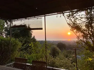 Lever ou coucher de soleil vu de la maison de vacances ou à proximité
