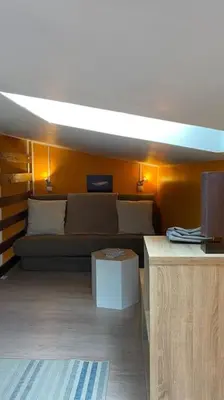 Télévision ou salle de divertissement dans l'établissement Tranquillité ,vue mer