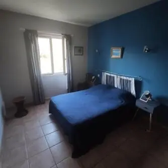 Un ou plusieurs lits dans un hébergement de l'établissement Villa E case di u Puntale
