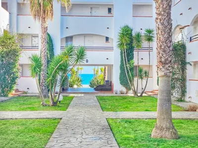 Jardin de l'établissement Casa Johanna, plage et piscine