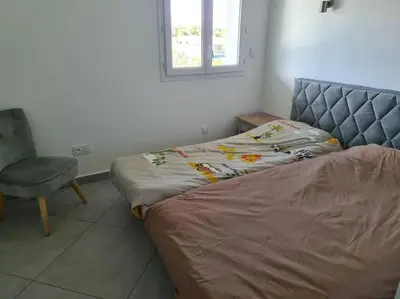 Un ou plusieurs lits dans un hébergement de l'établissement Appartement de détente et vue sur montagnes