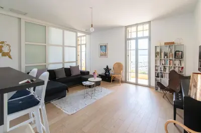 Coin salon dans l'établissement Superbe appartement vue mer - terrasse et parking