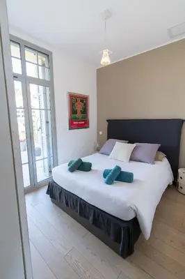 Un ou plusieurs lits dans un hébergement de l'établissement Superbe appartement vue mer - terrasse et parking
