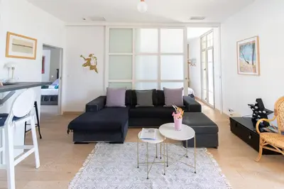 Coin salon dans l'établissement Superbe appartement vue mer - terrasse et parking
