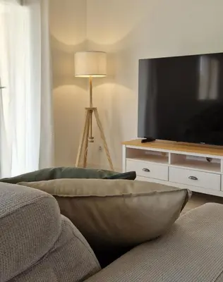 Télévision ou salle de divertissement dans l'établissement Casamea - T3 U Benestà