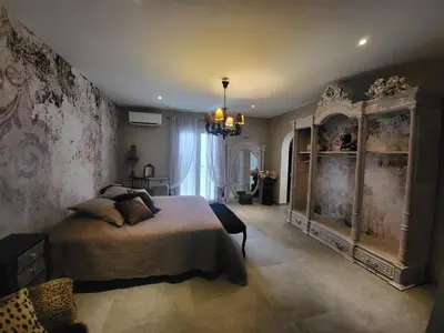 Un ou plusieurs lits dans un hébergement de l'établissement VILLA luxueuse privée avec piscine lagon