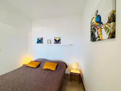 Un ou plusieurs lits dans un hébergement de l'établissement Appartement Libeccio 41 LUMIO
