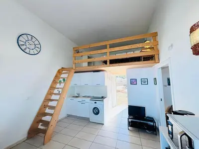 Un ou plusieurs lits dans un hébergement de l'établissement Appartement Libeccio 41 LUMIO