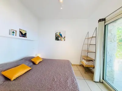Un ou plusieurs lits dans un hébergement de l'établissement Appartement Libeccio 41 LUMIO