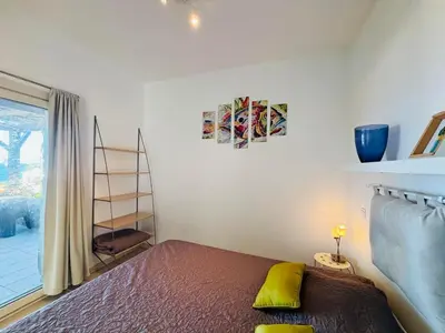 Un ou plusieurs lits dans un hébergement de l'établissement Appartement Libeccio 42 LUMIO