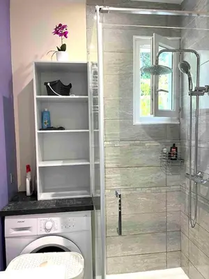 Salle de bains dans l'établissement Maison charmante à San-Nicolao 55 m² avec piscine partagée