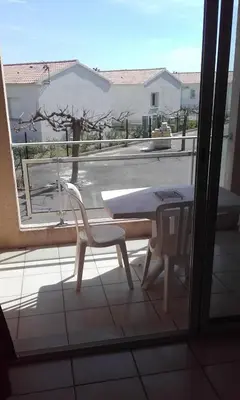 Balcon ou terrasse dans l'établissement Haute Corse. Studio 4 pers .Plage Piscine. Cervione Prunete .
