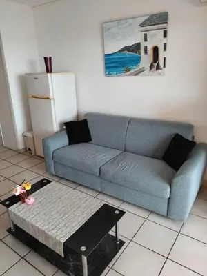 Coin salon dans l'établissement Haute Corse. Studio 4 pers .Plage Piscine. Cervione Prunete .