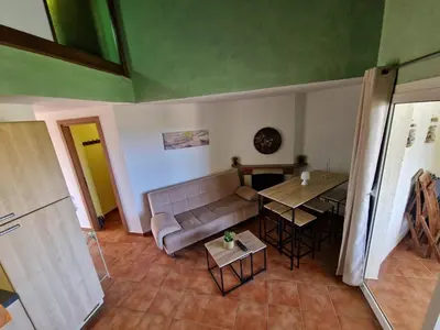 Coin salon dans l'établissement Appartement dans résidence