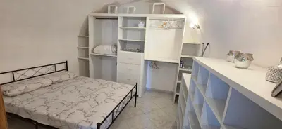 Un ou plusieurs lits dans un hébergement de l'établissement Charmante Maison de village, Proche Aéroport