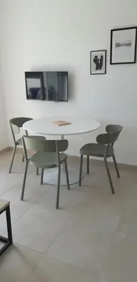 Télévision ou salle de divertissement dans l'établissement T2 VUE MER MARINA DI BRAVONE N197