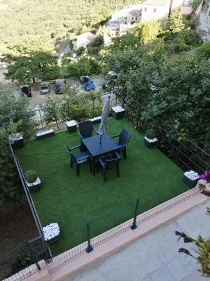 Jardin de l'établissement Studio neuf à 15mn de la mer