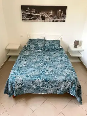 Un ou plusieurs lits dans un hébergement de l'établissement Bel Appartement en plein cœur de Folelli