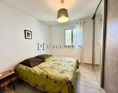 Un ou plusieurs lits dans un hébergement de l'établissement Appartement Cardellu Paisible & centre-ville CALVI