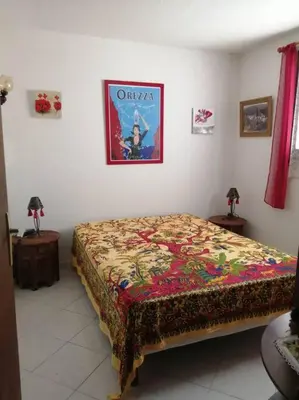 Un ou plusieurs lits dans un hébergement de l'établissement Maison près de la plage