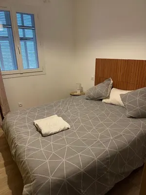 Un ou plusieurs lits dans un hébergement de l'établissement Bas de villa pour 6