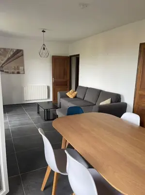 Coin salon dans l'établissement Bas de villa pour 6