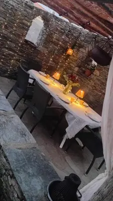 Coin salon dans l'établissement Maison familiale charmante