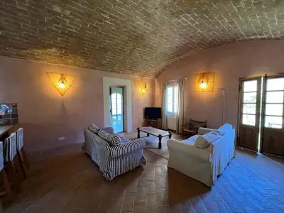 Télévision ou salle de divertissement dans l'établissement MAISON DE CARACTERE A PIGNA