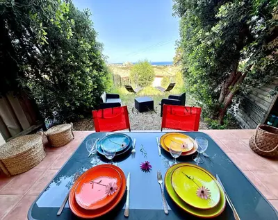 Jardin de l'établissement Appartement Manuro Paisible & vue mer CALVI