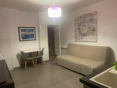 Coin salon dans l'établissement T2 4ème étage Bastia marché