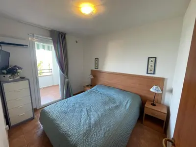 Un ou plusieurs lits dans un hébergement de l'établissement Appartement T3 les pieds dans l'eau