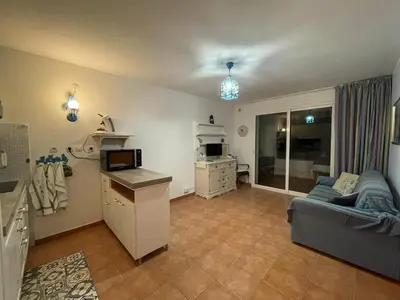 Cuisine ou kitchenette dans l'établissement Appartement T3 les pieds dans l'eau