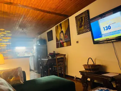 Télévision ou salle de divertissement dans l'établissement À casetta