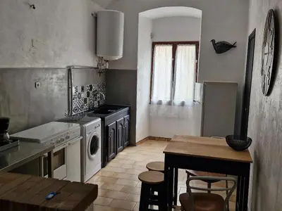 Cuisine ou kitchenette dans l'établissement Appartement centre Saint Florent