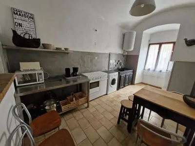Cuisine ou kitchenette dans l'établissement Appartement centre Saint Florent